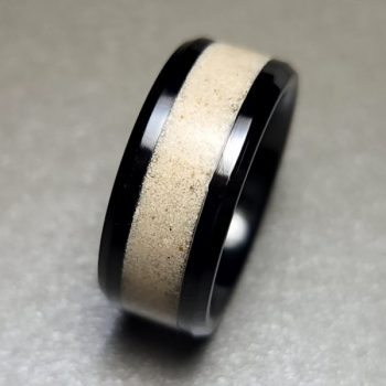 Ceramic ring with sand inlay